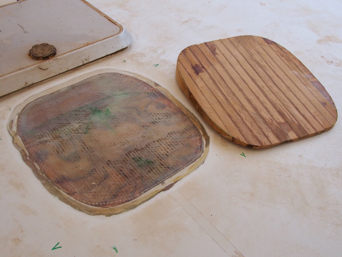 New teak hatch cover beside the old one