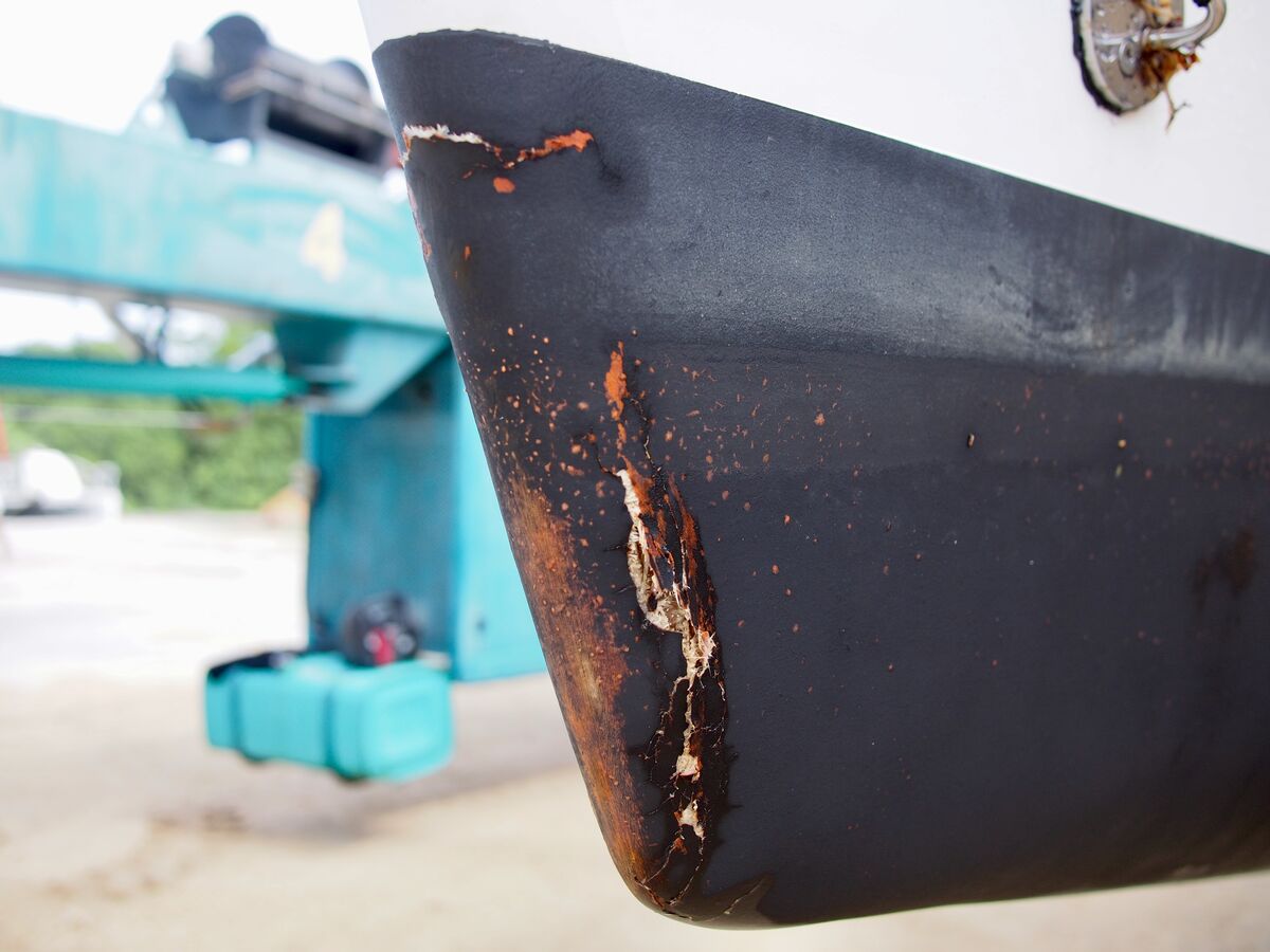 The small damage to the starboard bow from a floating tree trunk